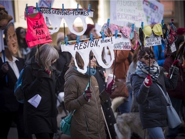 Women marched holding signs for Rick Chiarelli to resign at the 4th Annual Ottawa Women's March on Saturday.