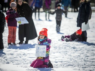 Seven-year-old Bianca Zappia showing off her Girls Rule sign on Parliament Hill on Saturday at the 4th Annual Ottawa Women's March.