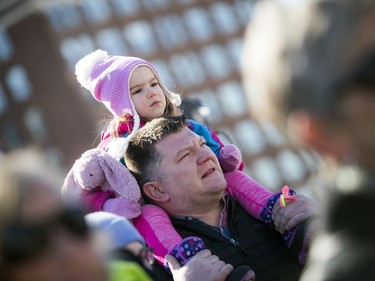 Lukas Ratkowski with his daughter, three-year-old Ivy on Parliament Hill on Saturday.