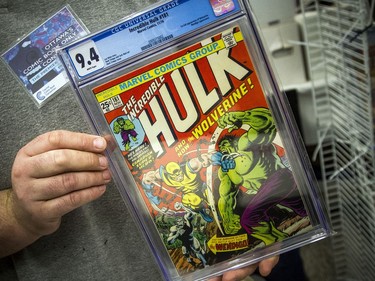 The Capital Comic Book Convention was held at the Delta hotel Sunday March 8, 2020. Ben Gosselin holds up the Incredible Hulk comic that is the highest priced comic they were selling in their booth.   Ashley Fraser/Postmedia