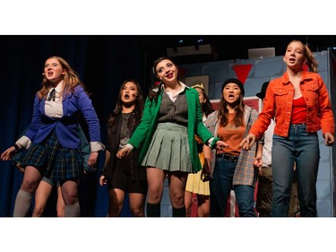 Veronica Sawyer played by Petra Ginther (L), New Wave Girl played by Sarah Baik (2ndFL), Heather Duke played by Rianna Persaud (M), Stonerchick played by Carol Guo (2ndFR), ensemble member played by Frida Pohl (R), during Colonel By Secondary School's Cappies production of Heathers, on March 6th, 2020, in Ottawa, On.