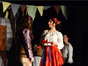 Clopin played by Jessica Goyette (L) and Esmeralda (R) played by Zoey Rowberry, during Sir Wilfrid Laurier Secondary School's Cappies production of The Hunchback of Notre Dame, held on March 5th, 2020 at Sir Wilfrid Laurier Secondary School in Ottawa, On.