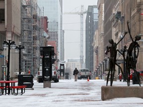 Ottawa Public Health says people in self-isolation can still go outside to take a walk or walk their dog but must avoid crowds and stay six feet away from other people — not a big problem during Monday's lunch hour on Sparks Street.