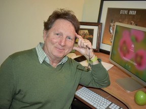 City columnist Kelly Egan wearing quite smashing attire in his new home office.