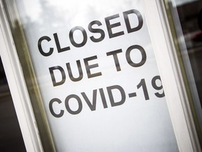 A sign on the front door of the Blackburn Arms Pub Restaurant on Saturday.