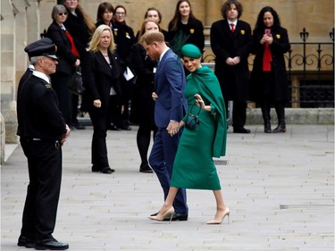 Britain's Prince Harry, Duke of Sussex, (L) and Meghan, Duchess of Sussex arrive to attend the annual Commonwealth Service at Westminster Abbey in London on March 09, 2020. - Britain's Queen Elizabeth II has been the Head of the Commonwealth throughout her reign. Organised by the Royal Commonwealth Society, the Service is the largest annual inter-faith gathering in the United Kingdom. (Photo by Tolga AKMEN / AFP)