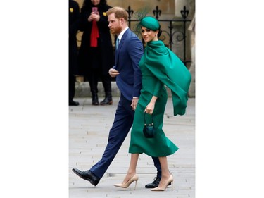 Britain's Prince Harry, Duke of Sussex, (L) and Meghan, Duchess of Sussex arrive to attend the annual Commonwealth Service at Westminster Abbey in London on March 09, 2020. - Britain's Queen Elizabeth II has been the Head of the Commonwealth throughout her reign. Organised by the Royal Commonwealth Society, the Service is the largest annual inter-faith gathering in the United Kingdom. (Photo by Tolga AKMEN / AFP)