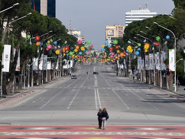 A picture taken on March 14, 2020, shows the empty main Boulevard of Tirana, amid the outbreak of COVID-19, the new coronavirus. -