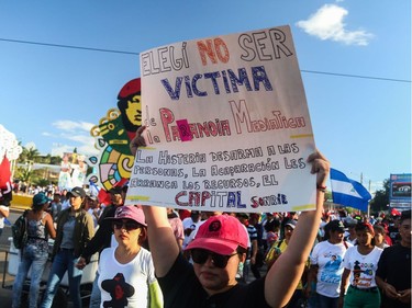 Supporters of Nicaraguan President Daniel Ortega take part in a demonstration called 'Love in times of COVID-19', in Managua on March 14, 2020.