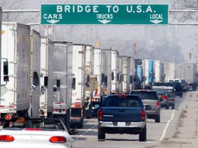 Traffic crosses the Canada-U.S. border in Windsor, Ont.