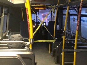 Tape in place to protest drivers' area on bus.