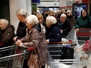 As the number of coronavirus cases grow around the world, an Iceland store in the Kennedy Centre in Belfast, Northern Ireland opened one hour early to allow elderly shoppers to buy food.