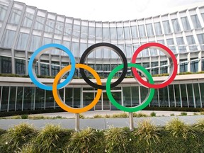 FILE PHOTO: The Olympic rings are pictured in front of the International Olympic Committee (IOC) in Lausanne, Switzerland,