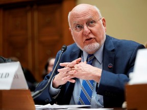 FILE PHOTO: Director of the Centers for Disease Control and Prevention (CDC) Dr. Robert Redfield testifies about coronavirus preparedness and response to the House Government Oversight and Reform Committee on Capitol Hill in Washington, U.S., March 12, 2020.