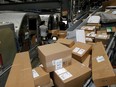FILE PHOTO: United Parcel Service employees load packages at the UPS Worldport International Hub