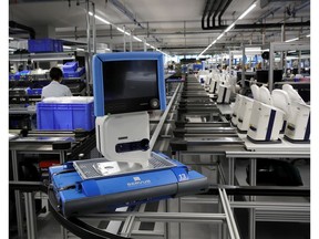 File photo: A ventilator of Hamilton Medical AG is transported on a conveyor at a plant in Domat/Ems, Switzerland March 18, 2020.