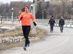 Runners and walkers try for some exercise along the Rideau Canal during the COVID-19 pandemic lockdown.