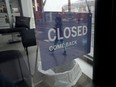 Closed businesses on Bank Street in Ottawa Monday March 30, 2020.