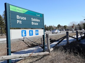 Dog owners arriving at Bruce Pit in Ottawa Friday March 27, 2020. In a move certain to disappoint dog walkers and hikers in the throes of cabin fever, the National Capital Commission is temporarily closing vehicle access to the Greenbelt encircling the capital.   Tony Caldwell