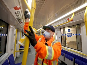 A worker cleans on the LRT.