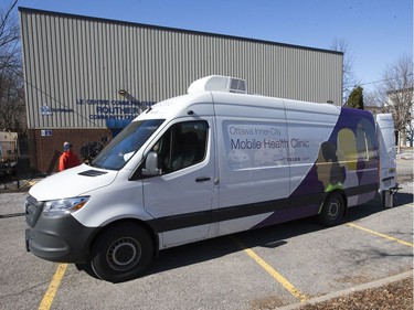 Mayor Jim Watson tours the Mobile Health Clinic operated by Ottawa Inner City Health.