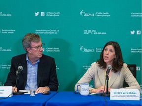 Files:   Jim Watson, Mayor of Ottawa, and Dr. Vera Etches, Medical Officer of Health, Ottawa Public Health, during a press conference.