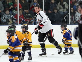 YELLOWKNIFE, N.W.T. NOVEMBER 18, 2012 Senator Chris Neil (pictured) and other pros took on some local young players during intermission.