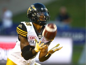 Fieles TiCats Jalen Saunders catches then runs with a kickoff return during CFL action between the Hamilton Tiger Cats and the Calgary Stampeders, Saturday, July 29, 2017.