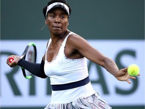 FILE: Venus Williams of the United States plays a forehand against Angelique Kerber of Germany during their women's singles quarterfinal match at the BNP Paribas Open at the Indian Wells Tennis Garden on March 14, 2019 in Indian Wells, California. (Photo by Sean M. Haffey/Getty Images)