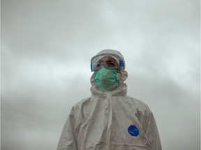 HUESCA, SPAIN - APRIL 01: A volunteer from the Spanish Red Cross wearing personal protective equipment.