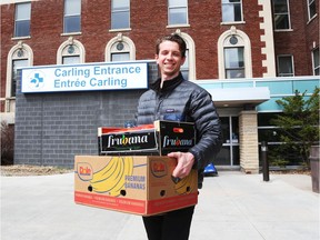 Tyler Doucet delivers donated fruits from Produce Depot to the ICU department of the Civic Campus of The Ottawa Hospital during the Covid-19 pandemic, April 14, 2020