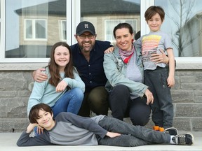 Matt West and Angie Mills with the stars of their blended family's film: Scarlett West, 12, Angus Mills, 11 and Roman West, 6.