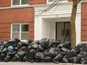Huge pile of garbage in front of Lisgar Avenue building on April 8, 2020.