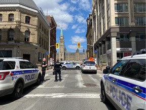 Ottawa police and the RCMP closed off a large area near 90 Wellington St. Saturday morning to investigate a suspicious package.