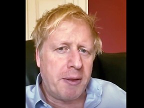 A still image from footage released by 10 Downing Street, the office of the British prime minister, on April 3, 2020 shows Britain's Prime Minister Boris Johnson in 10 Downing Street central London giving an update on his condition after he announced that he had tested positive for the new coronavirus on March 27, 2020.