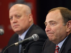 NHL commissioner Gary Bettman (right) and deputy commissioner Bill Daly have been providing the league governors with a bi-weekly update on league issues and the latest from the medical experts they've been working with regarding COVID-19. (John Locher/The Associated Press)