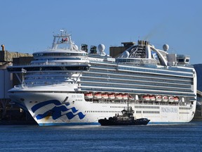 The Ruby Princess cruise ship, the subject of a criminal investigation with Australian authorities after allowing passengers infected with the coronavirus disease (COVID-19) to disembark in Sydney the prior month, docks with crew only onboard at Port Kembla in Wollongong, Australia, April 6, 2020.