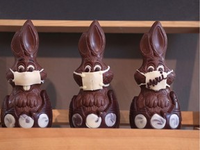 Chocolate Easter bunnies wearing protective masks are seen in the workshop of Belgian artisan chocolate maker Genevieve Trepant, during the coronavirus disease (COVID-19) outbreak in Lonzee, Belgium April 10, 2020.