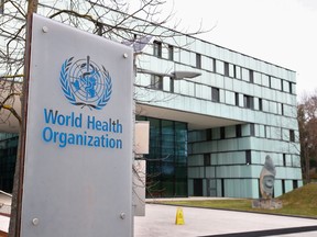FILE PHOTO: A logo is pictured outside a building of the  World Health Organization (WHO)