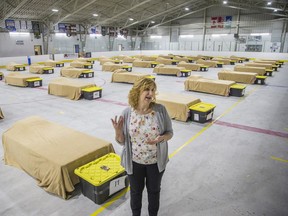 OTTAWA --April 29, 2020.  A tour of the Jim Durrell Arena with Shelley VanBuskirk, director of housing for the city.  The arena has been converted to be used as a temporary physical distancing centre for men to help alleviate the crowding at area shelters. This is one of the two hockey pads that will be for sleeping.