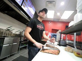 OTTAWA - April 13, 2020 - Mark Fernandez, who runs Markie's Montreal Smoked Meat, in Ottawa Monday.