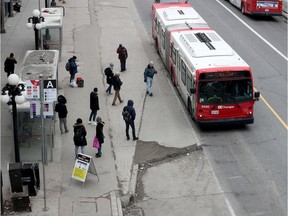 Getting on a bus on Rideau Street.