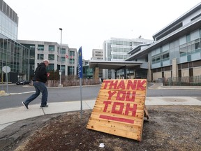 A 'thank you' sign appears outside the General Campus of The Ottawa Hospital last month. Dozens of COVID-19-related research projects are underway at the hospital.