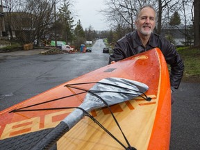 Kenneth Abraham says paddleboarding is a safe alternative to walking and biking on crowded multi-use pathways.