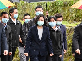 Taiwan President Tsai Ing-wen (centre) has led successful efforts in her country to hold the pandemic at bay.