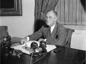 In this May 7, 1933, file photo, President Franklin D. Roosevelt is shown at his desk at the White House.