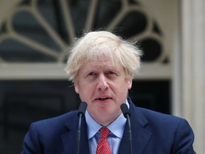 Boris Johnson, U.K. prime minister, delivers a statement outside number 10 Downing Street in London, U.K., on Monday, April 27, 2020. Johnson is back at work to lead the U.K.'s efforts to tackle the coronavirus, amid calls to ease the lockdown that has brought swathes of the economy to a standstill.