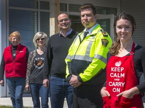 Three Mississippi Mills-area businesses played hot potato with $1,500 that eventually found its way back to the community: From left, Shirley Fulton-Deugo (with Fulton's Pancake House), Claire Mills and Omid McDonald (with Dairy Distillery), Travis Mellema (Lanark County Paramedic Services) and Madeline Downey (The English Pie Shop).