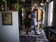 Joe Thottungal, the award-winning chef and owner of Coconut Lagoon, shows the damage after a fire broke out Friday night at the popular restaurant.
