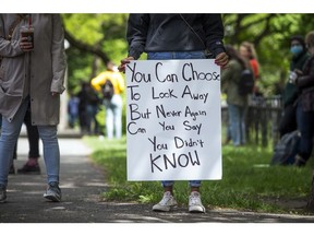 OTTAWA -- May 31, 2020 --Several hundred protestors gathered in Dundonald Park to attended a rally and vigil for Regis Korchinski-Paquet, Sunday, May 31, 2020. ASHLEY FRASER, Postmedia